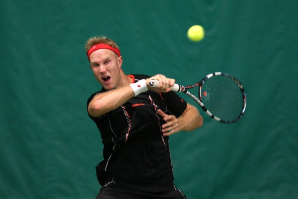 LONDON, ENGLAND - JUNE 07:  Dominic Inglot of Great Britain in action against Farrukh Dustov of Uzbekistan on the indoor courts during a qualifying match ahead of the AEGON Championships at Queens Club on June 7, 2014 in London, England.  (Photo by Jan Kruger/Getty Images)