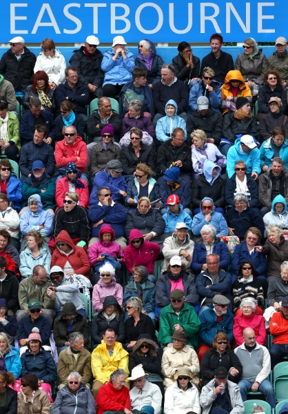 EASTBOURNE, ENGLAND - JUNE 22:  Fans wrap up warm during the women's singles final match between Jamie Hampton of the USA and Elena Vesnina of Russia on day eight of the AEGON International tennis tournament at Devonshire Park on June 22, 2013 in Eastbourne, England.  (Photo by Jan Kruger/Getty Images)