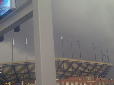 Check out that black cloud hanging over Arthur Ashe....well in NY, when it rains, it pours. 