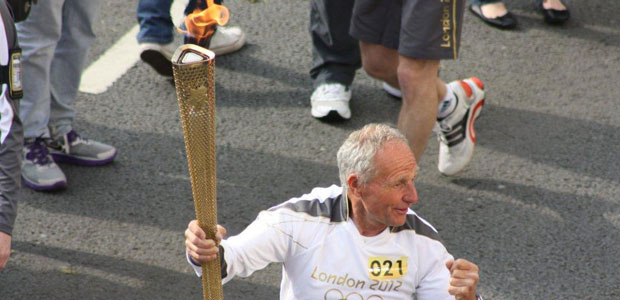 Keith Songhurst carrying the Olympic Torch
