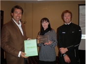 Simon Putner and Tracy Barnard receive the Clubmark Award at the Berkshire Club Forum