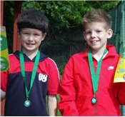 Luca Botessi and Harley Dyer receiving medals