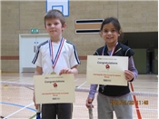 Isaac Rowles and Natasha Scott winning Mini Red Tournament