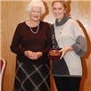 Team of the Year - Cheshire Ladies. Gemma Gibson receives the award from Mrs Jean Swiney