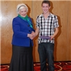 Junior Player of the Year, Jordan Young receives his award from Mrs Dianne Tod.
