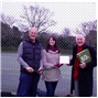 Head Coach Stewart Lees and Chairman Chris Cansfield receive the Clubmark award from Joanne Downing