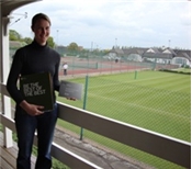 Alex Higham with the Clubmark plaque