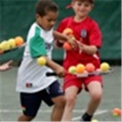 Children collecting balls