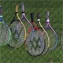 Rackets on a fence