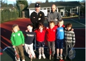 Umpires Nick Begy and Jhn Morton with Oakham's young tennis players, from left, Eoin Muris, Will Begy, Jenna Davies, George Emerson, Ben Morton and Josh Sennet