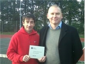 Lutterworth Head Coach Dave Lowden receiving the clubmark plaque from LTA Tennis Development Manager Paul Sheard