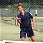 Andrew Castle, GMTV presenter practices before his turn on the court