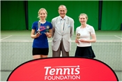 Beth Simmons (right, white top, blue skirt) recieving her women's singles runner-up trophy