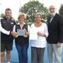 LTA President Peter Bretherton presenting the Clubmark plaque and certificate to Calne TC representatives, Catherine West, Sarah Brown and Phil Kerley