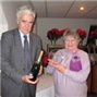 Amanda Foxton presented with the LTA Meritorious Award by Sir Geoffrey Owen