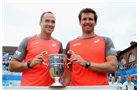 LONDON, ENGLAND - JUNE 15:  Alexander Peya (R) of Austria and Bruno Soares (L) of Brazil celebrate victory over Jamie Murray of Great Britain and John Peers of Australia to win the Men's Doubles Final match on day seven of the Aegon Championships at Queens Club on June 15, 2014 in London, England.  (Photo by Jan Kruger/Getty Images)